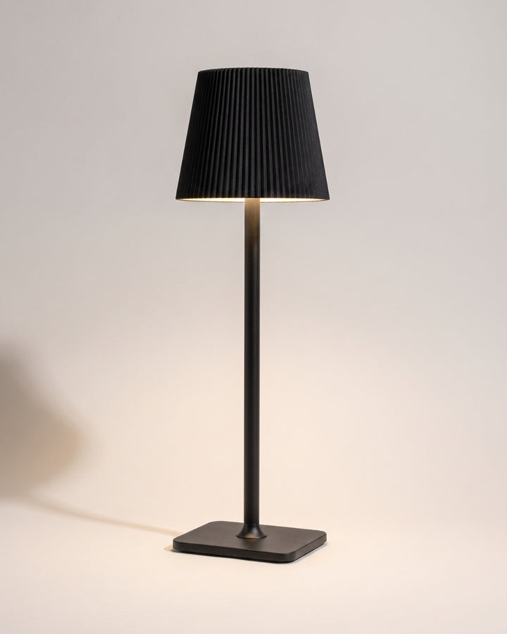 Velmo table lamp in black, tapered shade on a slender stem
