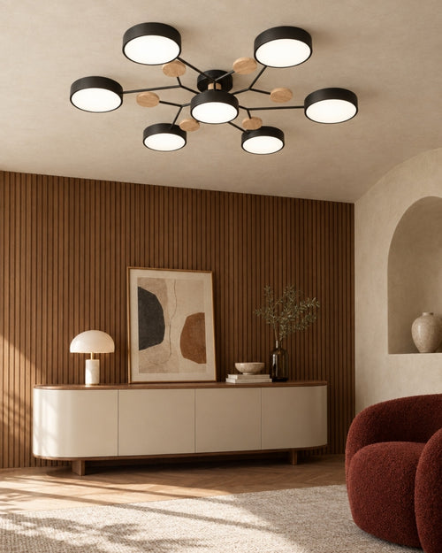 Amsel ceiling light in black, 7 lights, above a console or sideboard at home