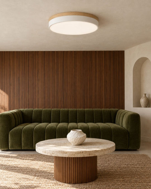 Feno ceiling light in white, above a sofa in a wood-panelled living room