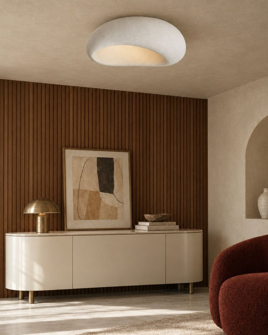 Luna ceiling light in white, above a marble sideboard and sofa in a living room