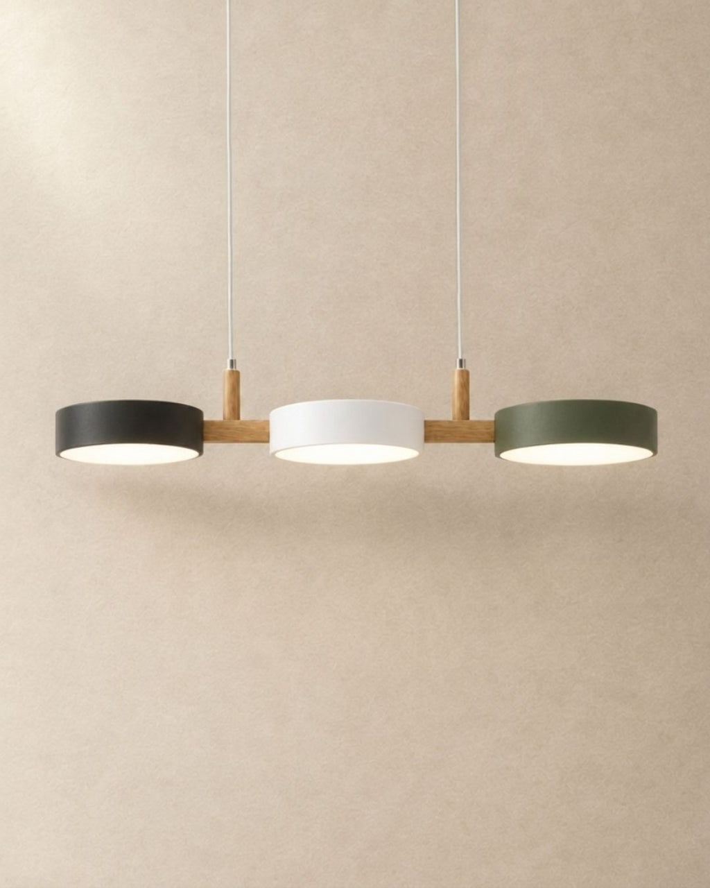 Brant pendant light in black, white and green, three fixtures, product photograph