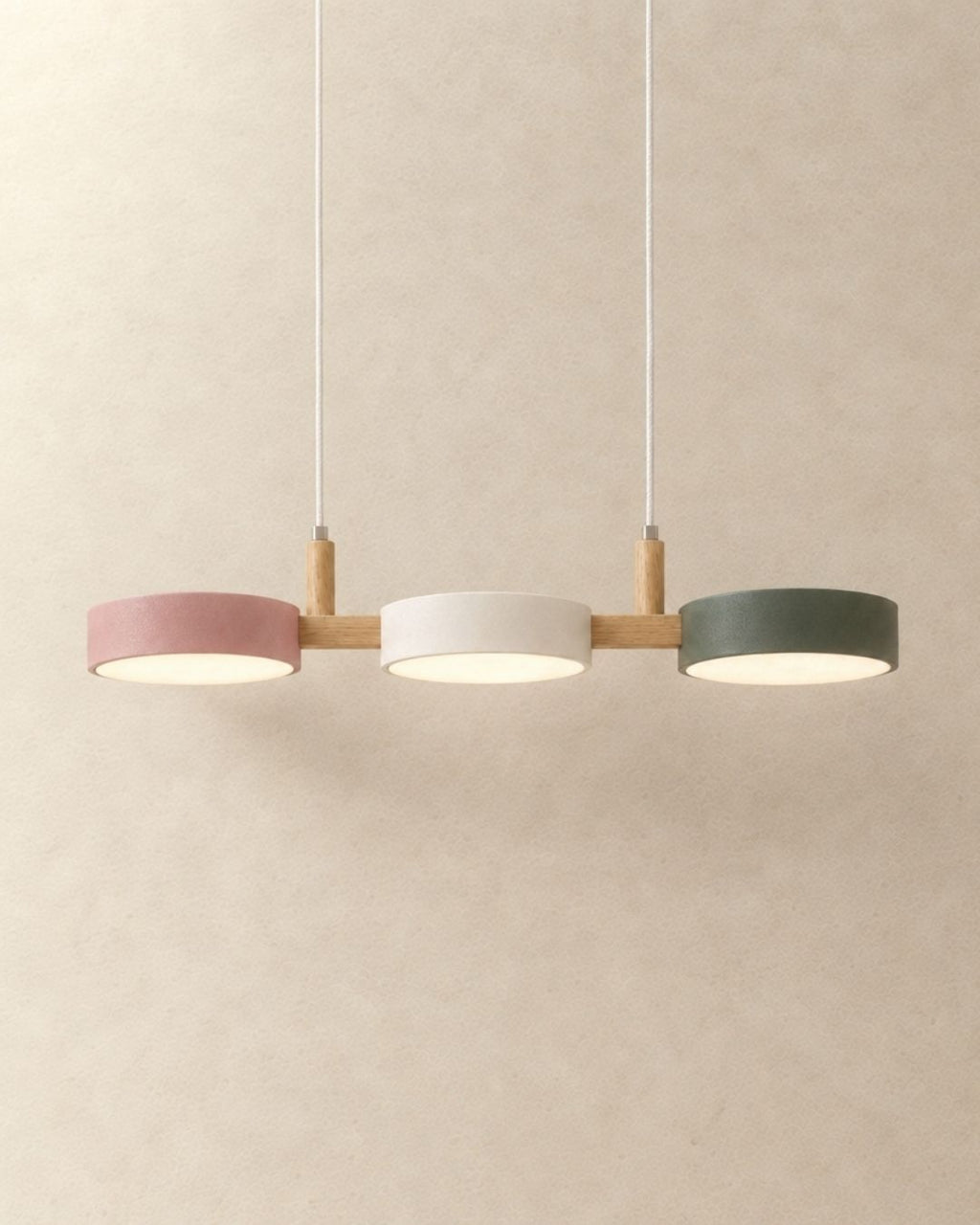 Brant pendant light in pink, white and green, three fixtures, product photograph