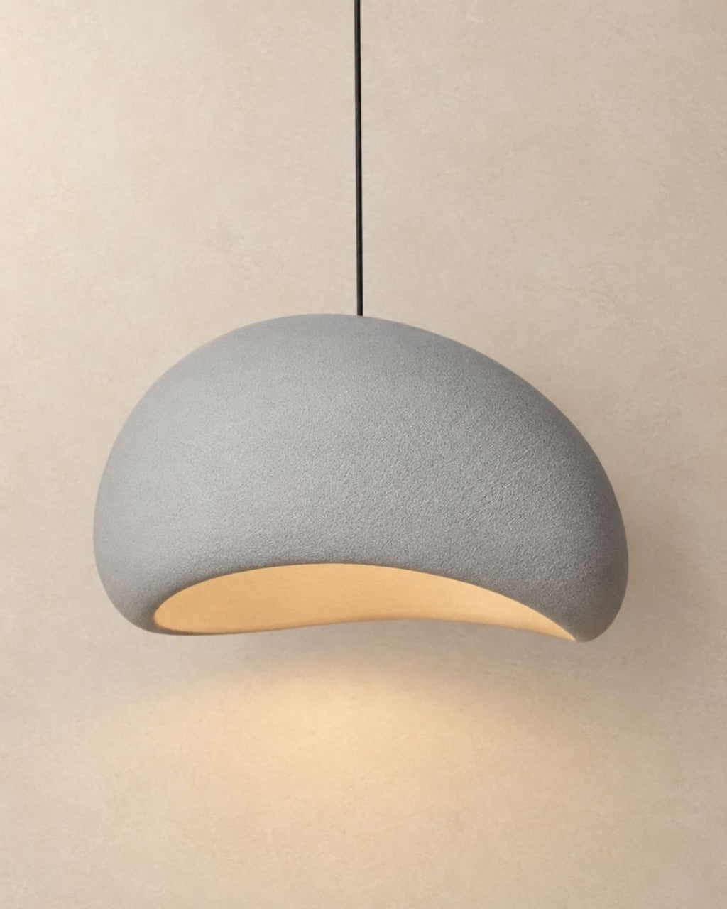 Desna pendant light in grey, rounded silhouette, product photograph