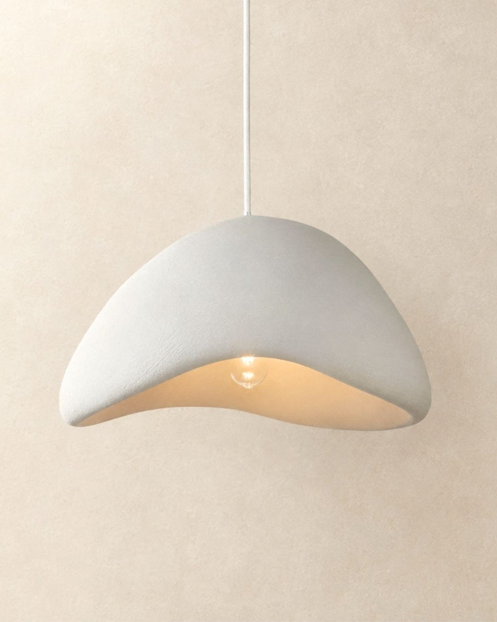Desna pendant light in white, wavy silhouette, product photograph