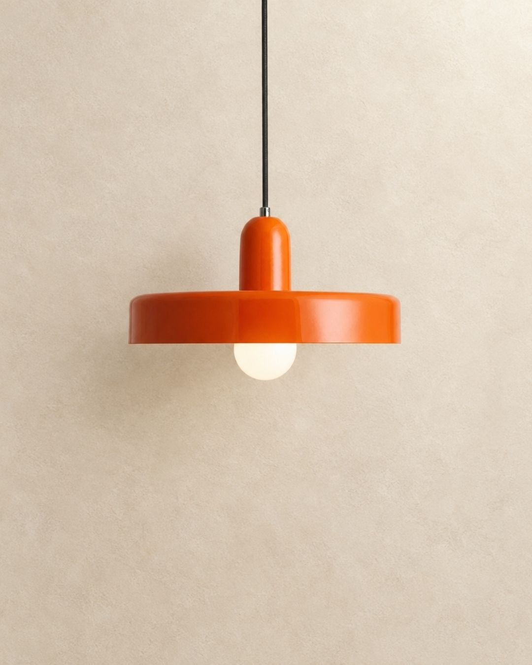 Nyla pendant light in orange, product photograph