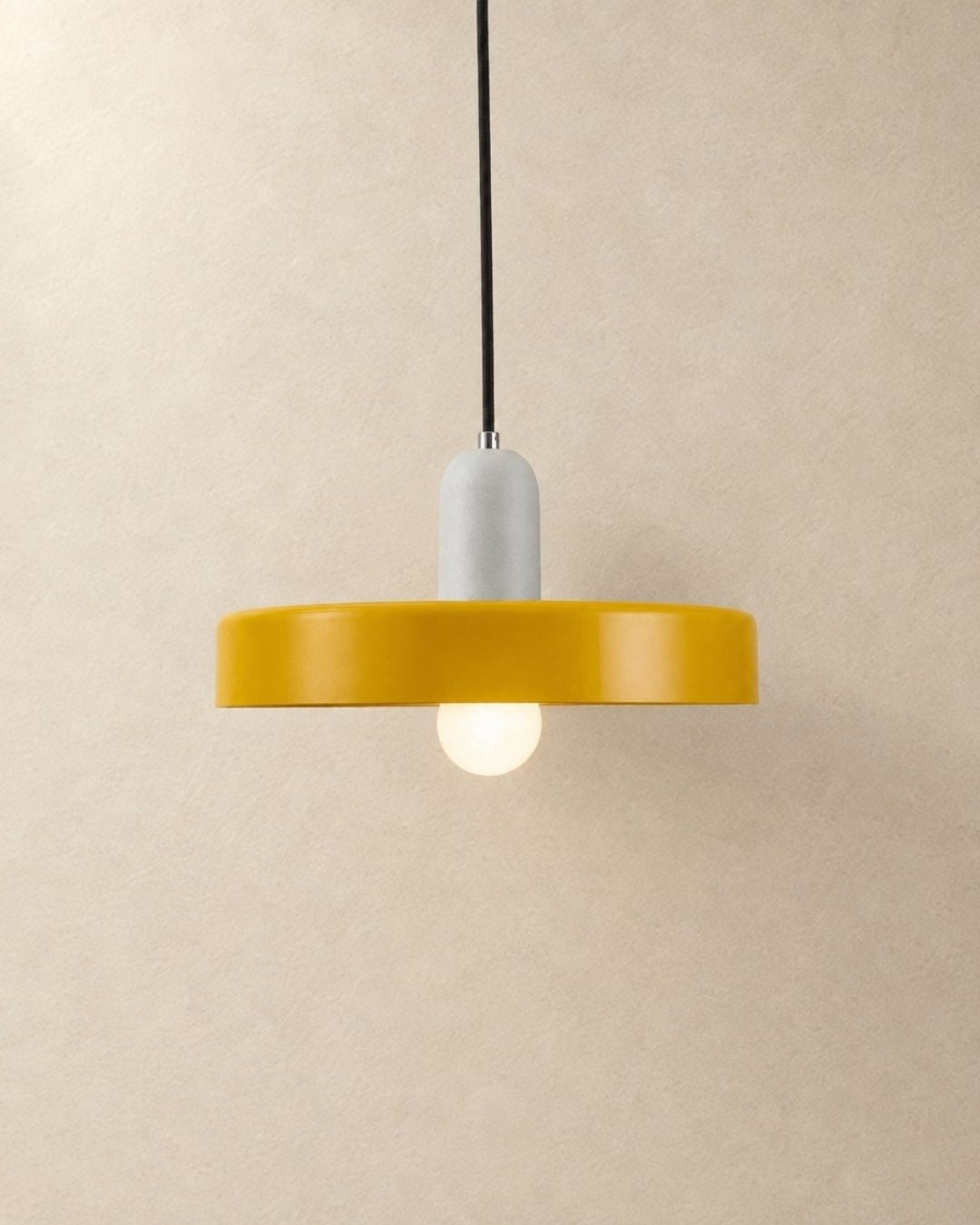 Nyla pendant light in white and yellow, product photograph