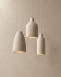 Ovana pendant light in beige, trio of fixtures, product photograph