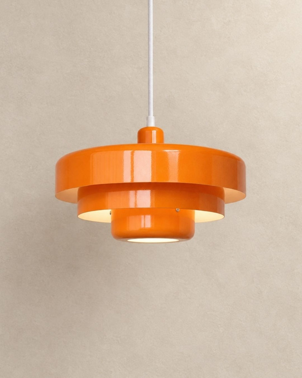 Tessia pendant light in orange, product photograph