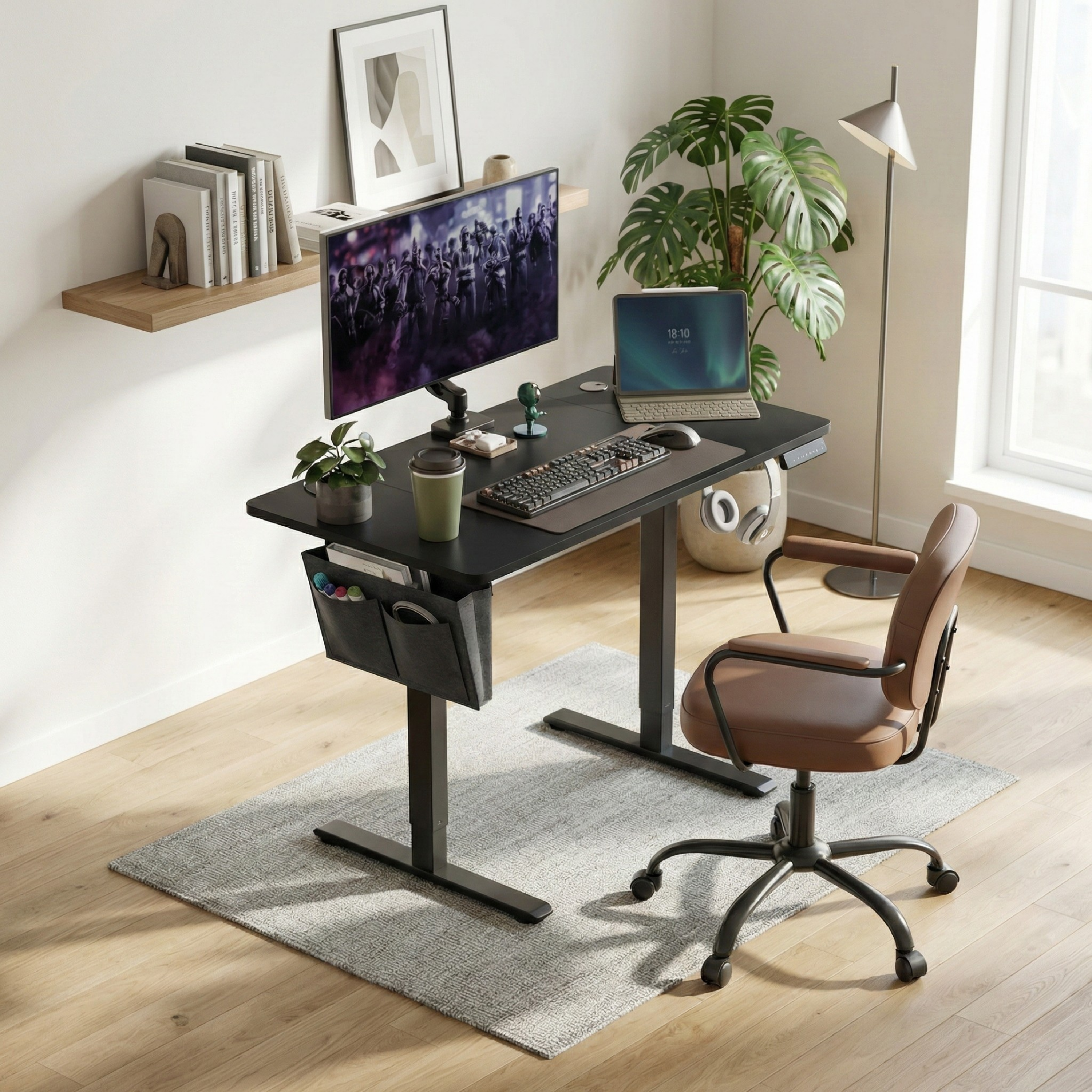 Standing desk Deskon in black, Height electric adjustable, in a modern office