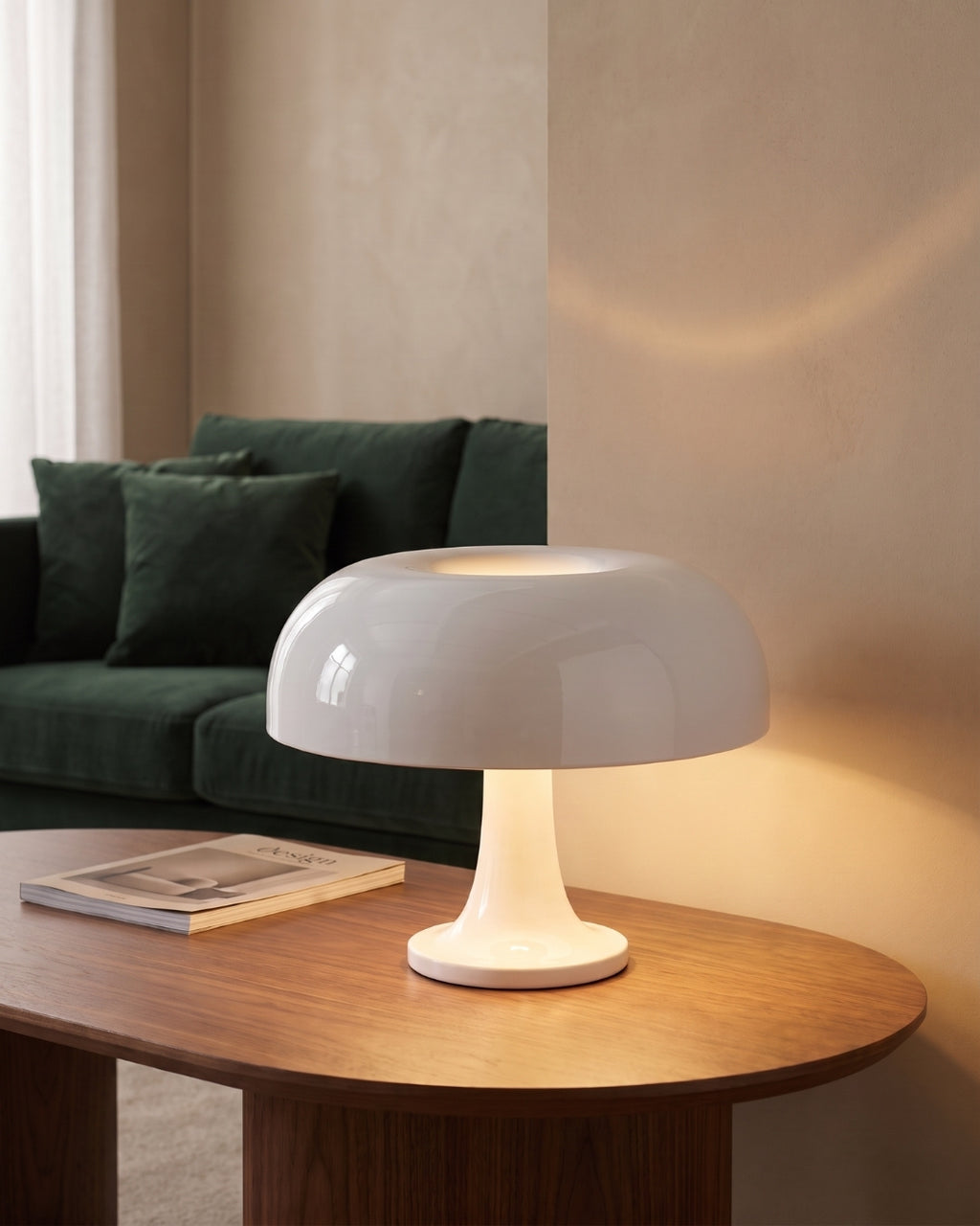 Beven table lamp in white lit on a wooden coffee table