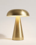 Cerlin table lamp in gold, domed shade on a tapered base