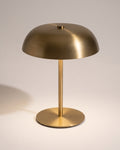 Gavetti table lamp in gold, mushroom shade on a slim body