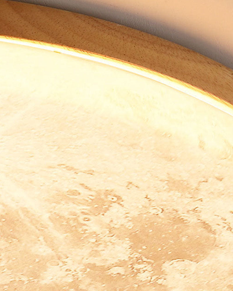 Erva ceiling light in wood, close view lit with a warm glow